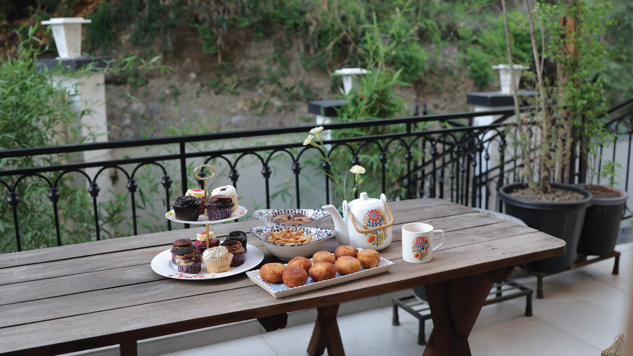 Breakfast set out on the terrace overlooking the trees
